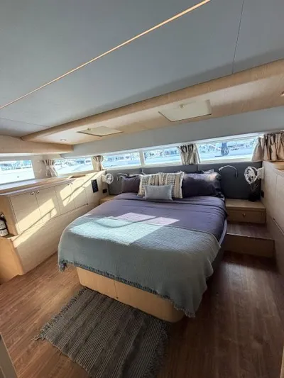 Grace Yacht Photos Pics Luxurious bedroom on a 2022 Aquila 54 yacht.