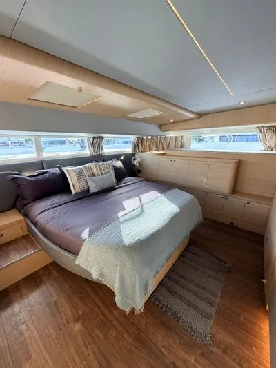 Grace Yacht Photos Pics Luxurious bedroom on a 2022 Aquila 54 yacht.
