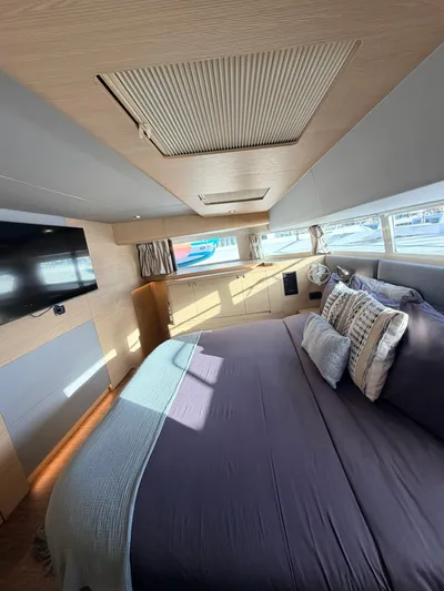 Grace Yacht Photos Pics Luxurious bedroom on a 2022 Aquila 54 yacht.