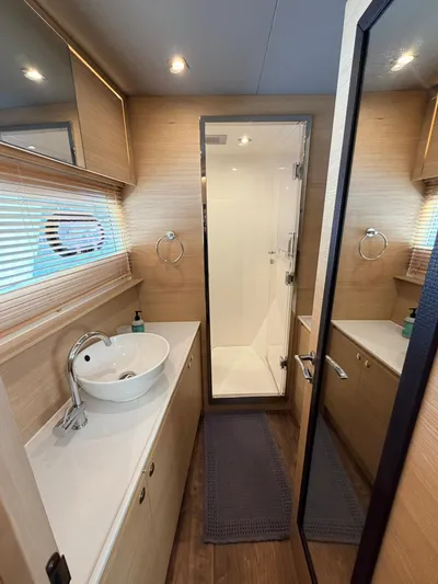 Grace Yacht Photos Pics Luxurious bathroom on the 2022 Aquila 54 yacht.