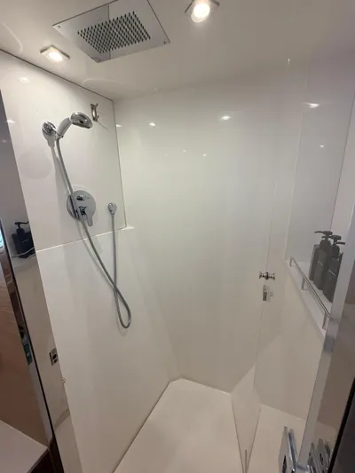 Grace Yacht Photos Pics Modern shower in a 2022 Aquila 54 yacht.