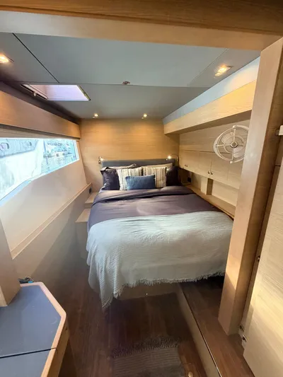 Grace Yacht Photos Pics Luxurious bedroom on a 2022 Aquila 54 yacht.