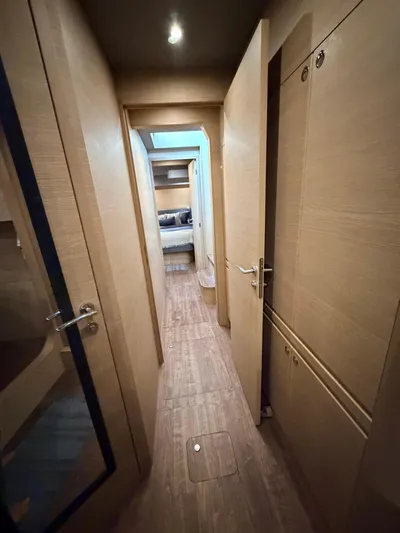 Grace Yacht Photos Pics Interior of Aquila 54 yacht, hallway with wooden doors, 2022 model.