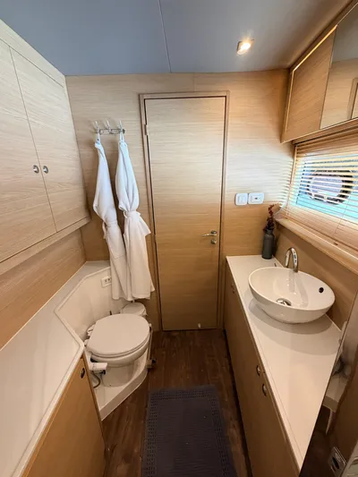 Grace Yacht Photos Pics Luxurious bathroom on a 2022 Aquila 54 yacht.