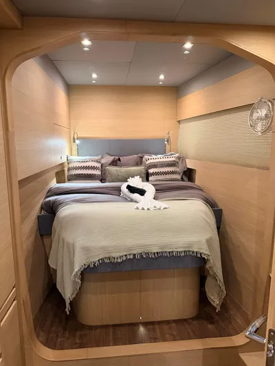 Grace Yacht Photos Pics Luxurious bedroom on a 2022 Aquila 54 yacht.