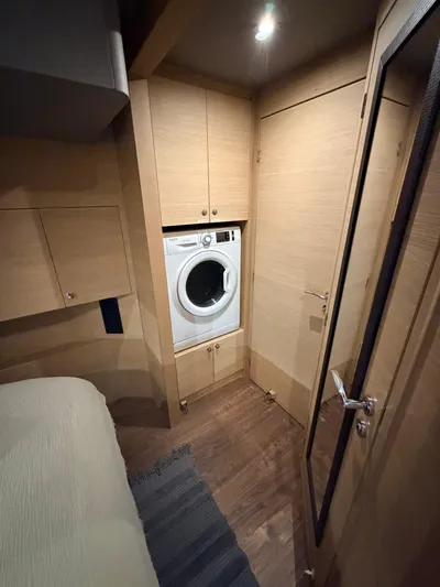Grace Yacht Photos Pics Washing machine in a modern Aquila 54 yacht, year 2022.