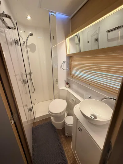 Grace Yacht Photos Pics Luxurious bathroom on Aquila 54 yacht, 2022 model.