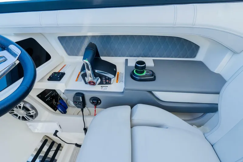  Yacht Photos Pics 2023 Sea Ray SLX 310 Outboard helm with modern controls and luxurious seating.