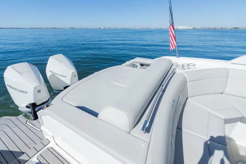  Yacht Photos Pics 2023 Sea Ray SLX 310 Outboard boat with twin Mercury engines on calm water.
