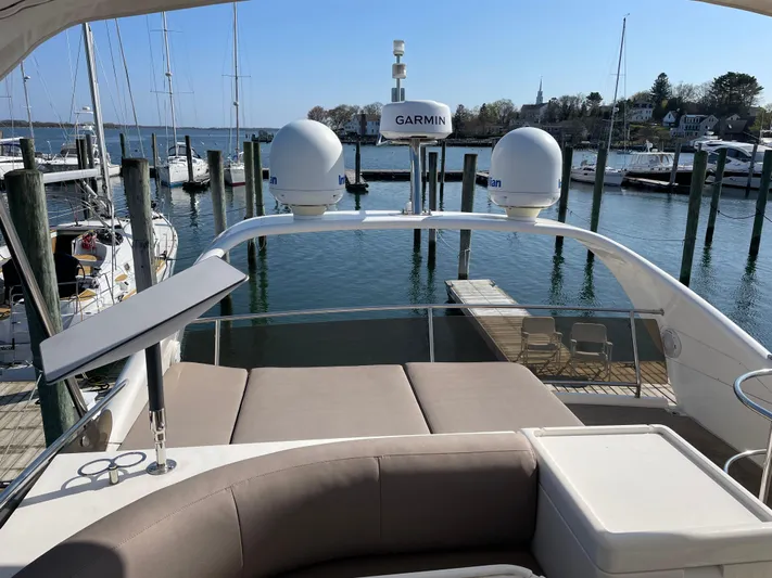  Yacht Photos Pics Flybridge view of 2005 Viking Princess 50 yacht docked at marina.