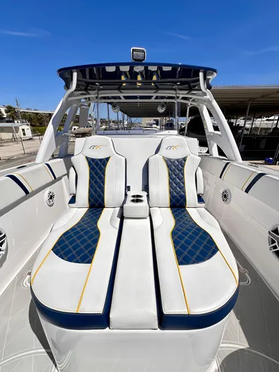  Yacht Photos Pics 2022 Midnight Express 37 Open boat with luxurious seating and modern design.