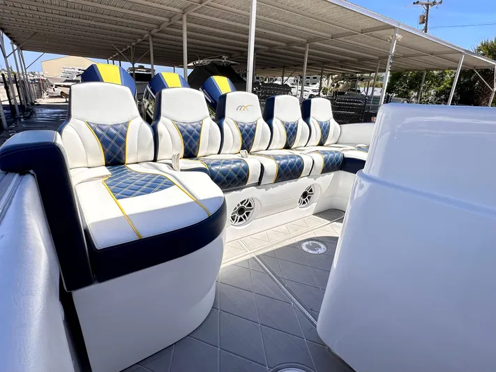 Yacht Photos Pics 2022 Midnight Express 37 Open boat with luxurious seating and modern design.