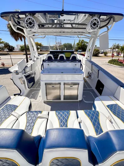  Yacht Photos Pics 2022 Midnight Express 37 Open boat with luxurious seating and modern amenities.