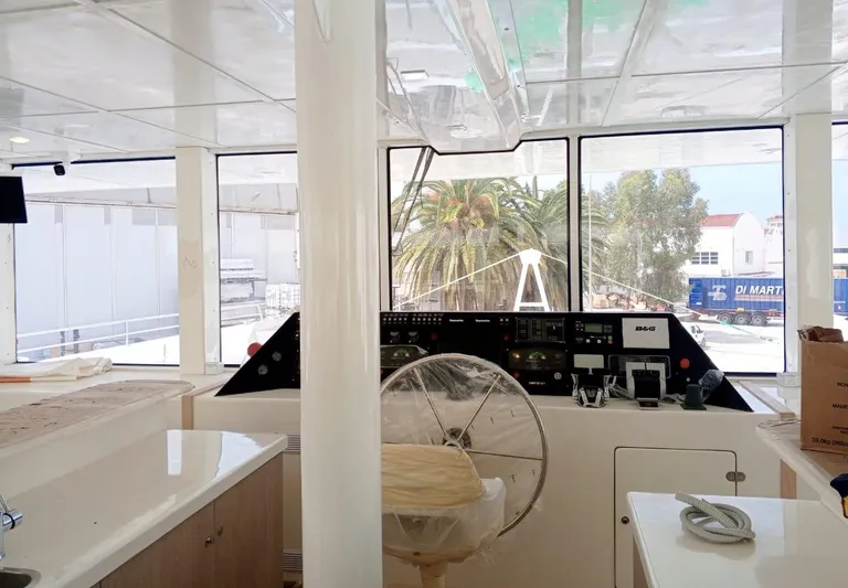  Yacht Photos Pics Interior of 2025 Squalt Marine CK 80 yacht, featuring modern helm and panoramic windows.