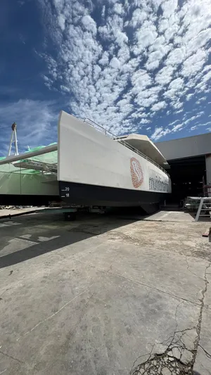  Yacht Photos Pics 2025 Squalt Marine CK 80 yacht in shipyard under a partly cloudy sky.