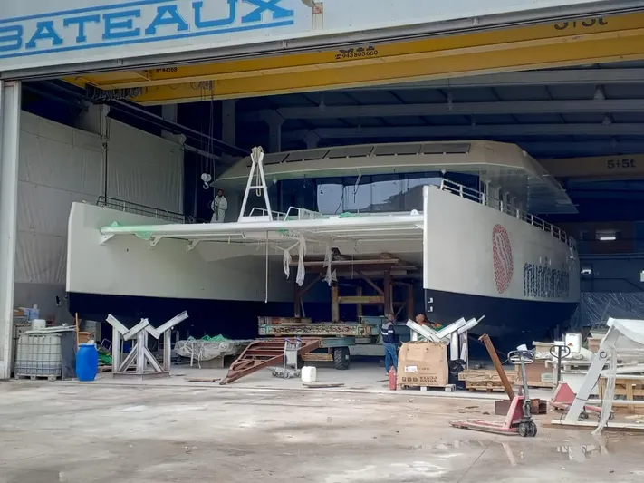  Yacht Photos Pics 2025 Squalt Marine CK 80 catamaran under construction in a shipyard.
