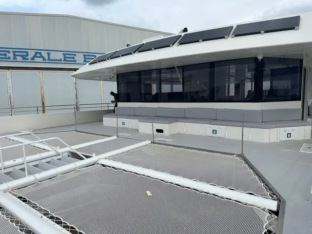  Yacht Photos Pics Modern Squalt Marine CK 80 yacht, 2025 model, featuring sleek design and solar panels.