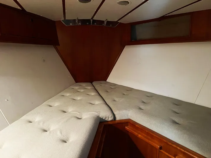 Here Be Dragons Yacht Photos Pics Interior cabin of 1987 Oyster 46.5 yacht with cozy twin beds.