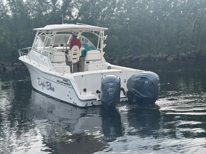  Yacht Photos Pics 2023 Grady-White Express 330 boat on calm water.