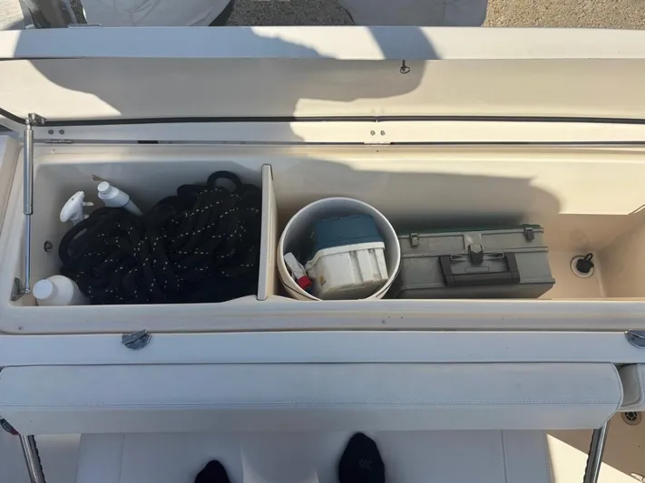  Yacht Photos Pics Storage compartment in Grady-White Express 330 boat, 2023 model.