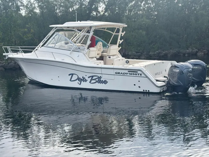  Yacht Photos Pics Grady-White Express 330 boat 2023 on calm water.