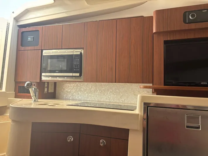  Yacht Photos Pics Interior of Grady-White Express 330 yacht kitchen, 2023 model.