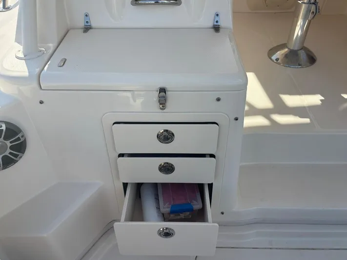 Yacht Photos Pics Grady-White Express 330 2023, open drawers in cockpit area.