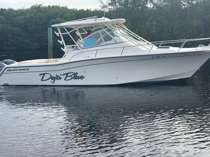  Yacht Photos Pics Grady-White Express 330 boat 2023 on calm water.