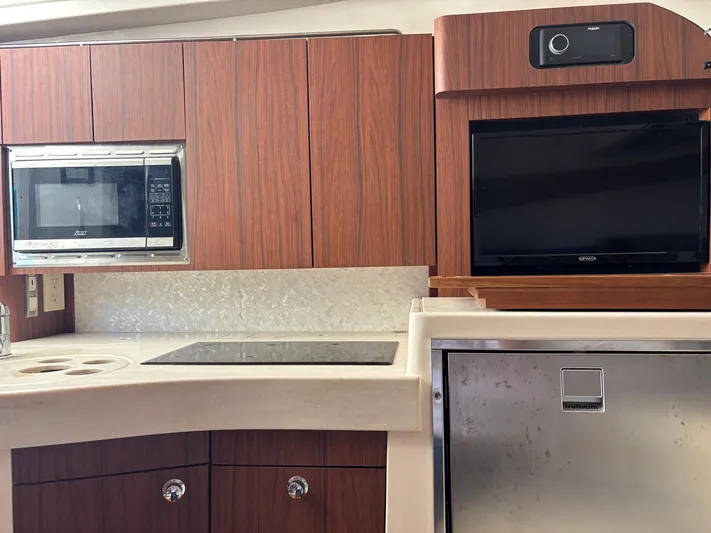  Yacht Photos Pics Interior of Grady-White Express 330 yacht kitchen, 2023 model.