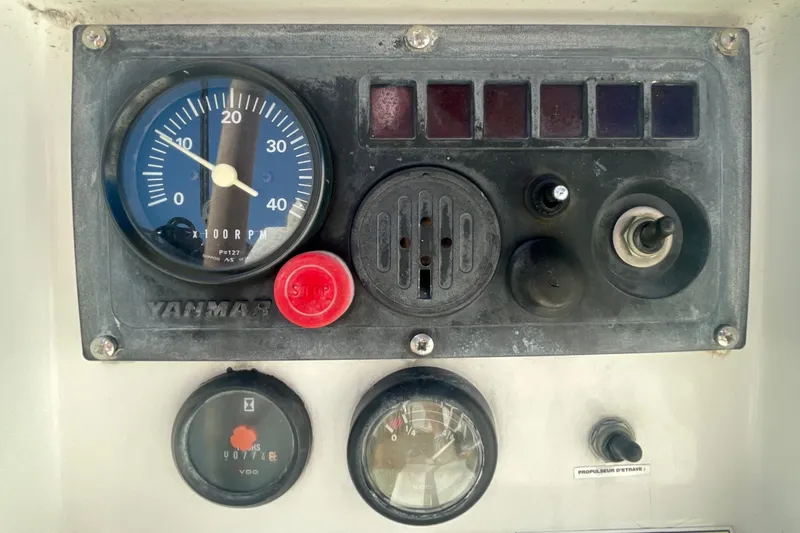 Caravan Yacht Photos Pics Control panel of a 2003 Beneteau First 47.7 sailboat with Yanmar engine gauges.