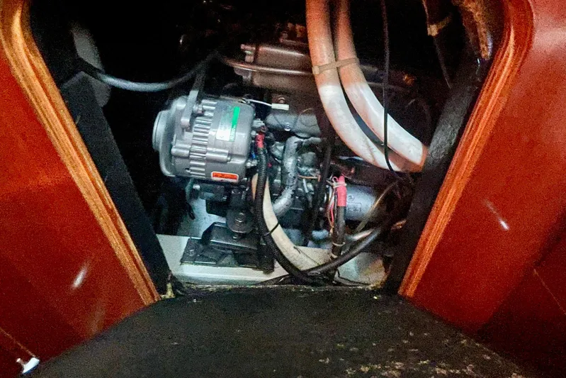 Caravan Yacht Photos Pics Engine compartment of 2003 Beneteau First 47.7 sailboat, showcasing mechanical components.