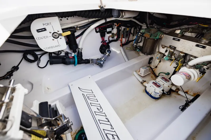  Yacht Photos Pics Engine compartment of a 2023 Jupiter 40 boat with technical components.
