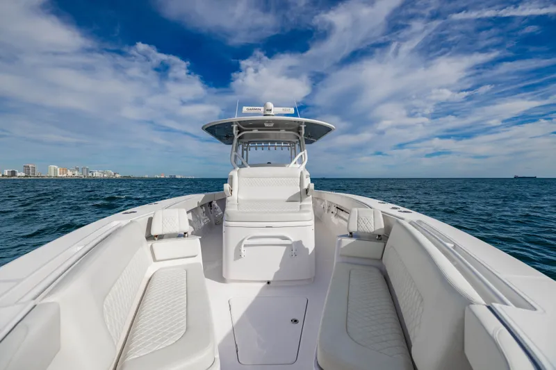  Yacht Photos Pics Jupiter 40 boat 2023 on open sea under blue sky.