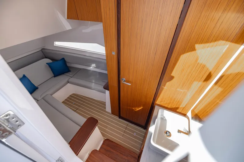  Yacht Photos Pics Interior of 2023 Jupiter 40 yacht with elegant wood paneling.