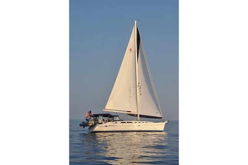 Optimistic Yacht Photos Pics 2003 Catalina 470 Sloop with Wing Keel sailing on calm waters.