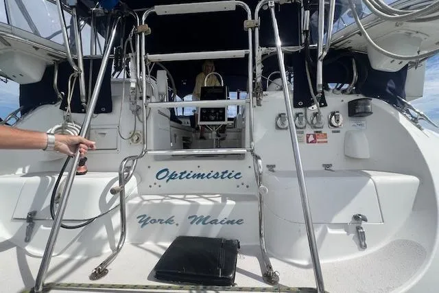 Optimistic Yacht Photos Pics 2003 Catalina 470 Sloop with Wing Keel, named "Optimistic," docked in York, Maine.