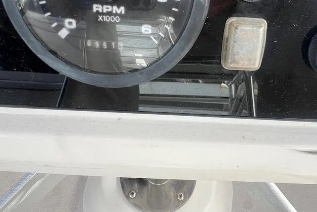 Optimistic Yacht Photos Pics Close-up of a 2003 Catalina 470 Sloop RPM gauge and control panel.