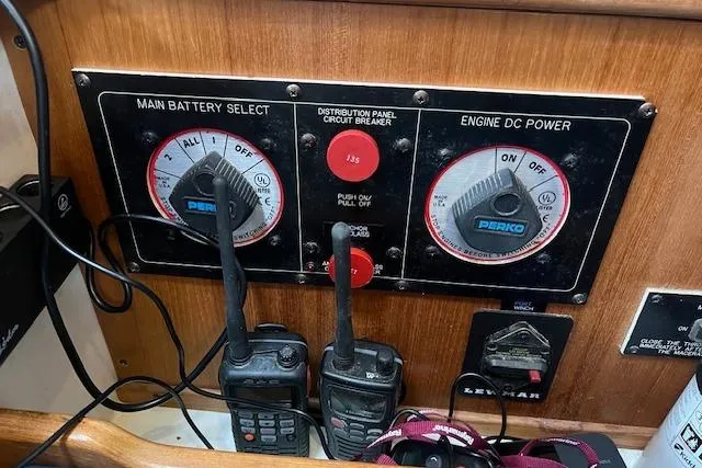 Optimistic Yacht Photos Pics Control panel of a 2003 Catalina 470 Sloop with radios and battery selectors.