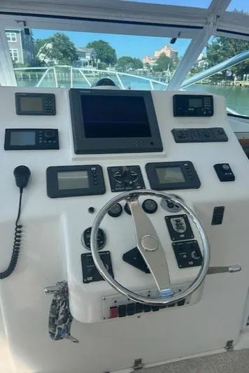  Yacht Photos Pics Control panel of a 2006 Topaz 40 Express boat with navigation equipment.