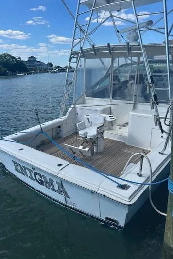  Yacht Photos Pics 2006 Topaz 40 Express boat docked at marina.