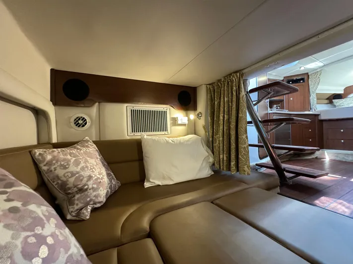  Yacht Photos Pics Luxurious interior of 2018 Crownline 350 SY yacht with cozy seating and elegant decor.