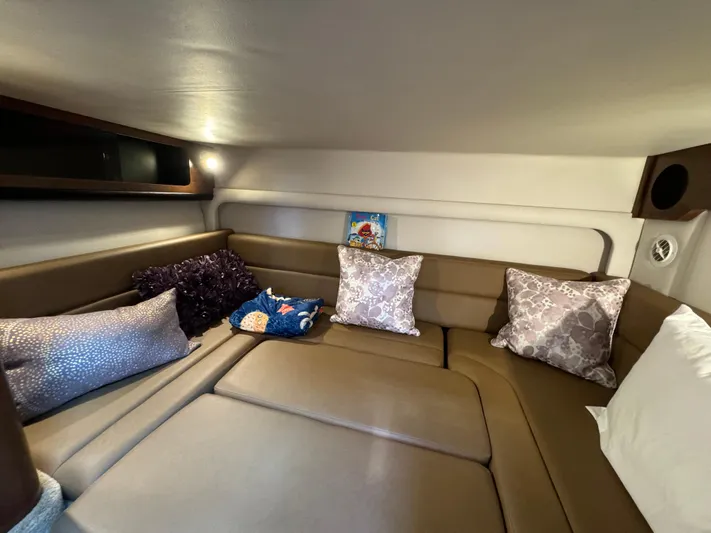  Yacht Photos Pics Interior cabin of 2018 Crownline 350 SY with cozy seating and decorative pillows.