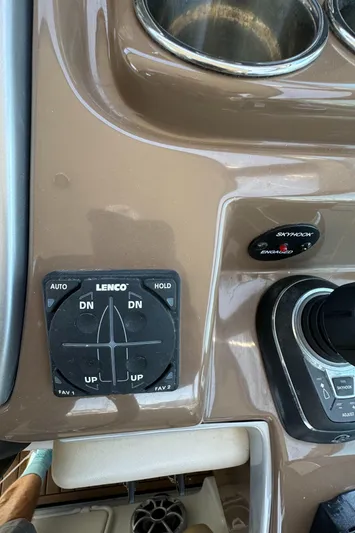  Yacht Photos Pics Control panel of 2018 Crownline 350 SY boat with Lenco trim tab switches.