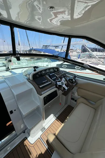  Yacht Photos Pics 2018 Crownline 350 SY yacht cockpit with modern controls and leather seating.