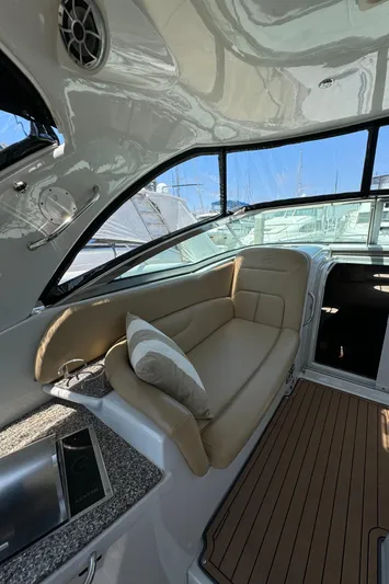  Yacht Photos Pics 2018 Crownline 350 SY yacht interior with beige seating and modern design.