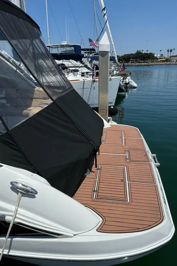  Yacht Photos Pics 2018 Crownline 350 SY yacht docked with teak swim platform.