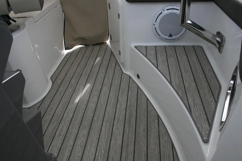 Skye Boat Yacht Photos Pics 2020 Pursuit OS 355 Offshore boat interior with sleek, modern flooring and speaker system.
