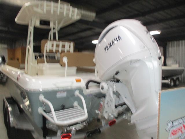 2025 Skeeter SX2550 boat with Yamaha outboard motor in a storage facility.