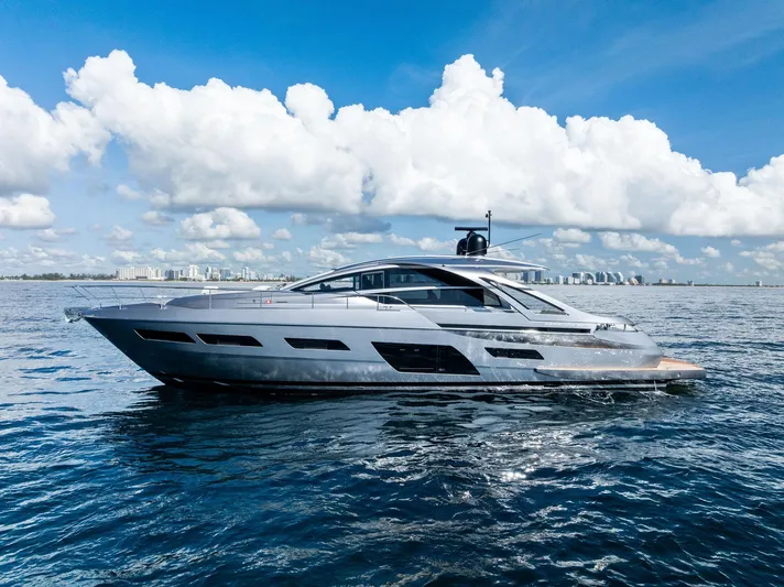 Barnext Yacht Photos Pics 2025 Pershing 7X yacht cruising on open water under a clear blue sky.