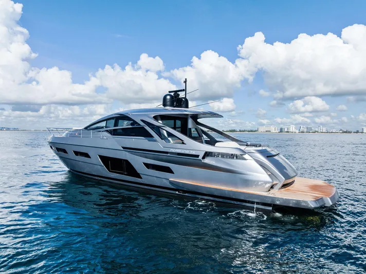 Barnext Yacht Photos Pics 2025 Pershing 7X yacht on open water under a blue sky with clouds.